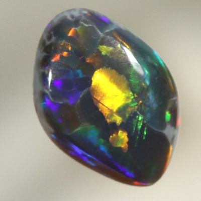 SOLID BLACK OPAL Brightest fire in a Flagstone Harlequin pattern